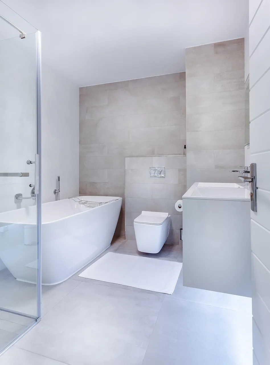 Freshly finished bathroom with clean tile, move-in ready after a remodel